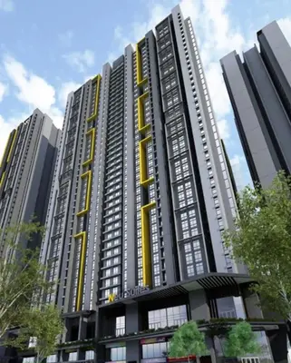 a large apartment building with yellow accents on it at Neu Suites by COBNB in Kuala Lumpur