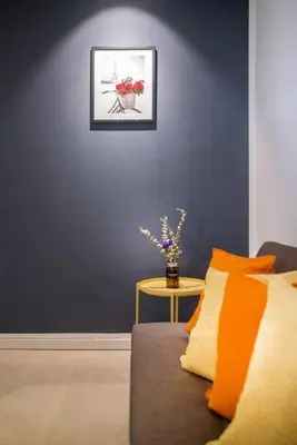 a living room with a couch and a table at Bintang Fairlane 2mins PavilionKL TRX KLCC - AJhome in Kuala Lumpur
