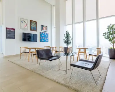 a dining room with a table and chairs at Maxhome Plus @ The Platinum KLCC in Kuala Lumpur