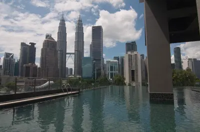 a view of a city skyline with tall buildings at Legasi Kampung Baru - Idealhub in Kuala Lumpur