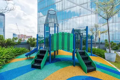 a playground in front of a building at Dorsett Residence Kuala Lumpur 12 in Kuala Lumpur