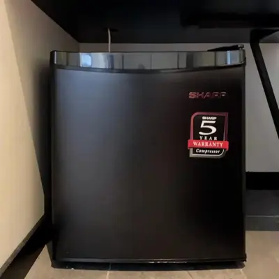 a black box with a sign on the side of it at M101 Dang Wangi remote work-friendly suite in Kuala Lumpur