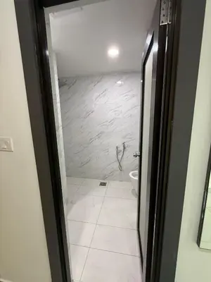 a bathroom with a shower and a toilet in it at Prime Suite at Ampang - Individual Private Rooms in Kuala Lumpur