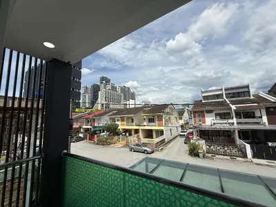 a view of a city street from a balcony at Prime Suite at Ampang - Individual Private Rooms in Kuala Lumpur