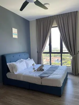 a bedroom with a bed with a ceiling fan and a window at Cozy Family Suite Kepong DesaPark MontKiara Publika Mitec in Kuala Lumpur