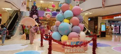 a large pile of balloons in a shopping mall at Plaza Berjaya Apt Bukit Bintang With Foosball in Kuala Lumpur