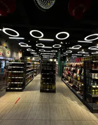 a store aisle with a lot of products on display at Star Residence Apartment with High Kuala Lumpur view in Kuala Lumpur