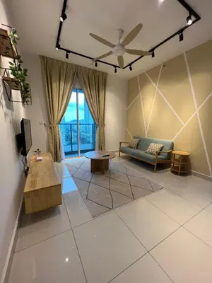 a living room with a couch and a table at Inspirasi Residences Mont Kiara muji house in Kuala Lumpur