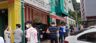 a group of people standing outside of a store at Plaza Berjaya Apt Bukit Bintang with Pool Table in Kuala Lumpur