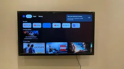 a wall mounted television with several different videos on it at M City Minimalist KLCC Suite in Kuala Lumpur