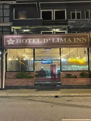 a store front of a building with a store at Hotel Dlima Inn Bukit Bintang in Kuala Lumpur