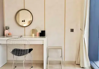 a room with a desk with a chair and a mirror at Star residance KLCC-Two bedroom Apartment in Kuala Lumpur