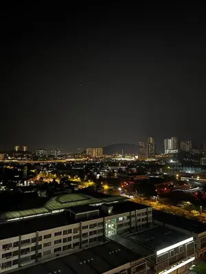 a view of a city at night with buildings at Zetapark, The Loft in Kuala Lumpur