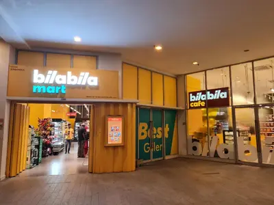a shopping mall with a biltiba mart sign on the front at Hostel At Regalia Sky Pool in Kuala Lumpur