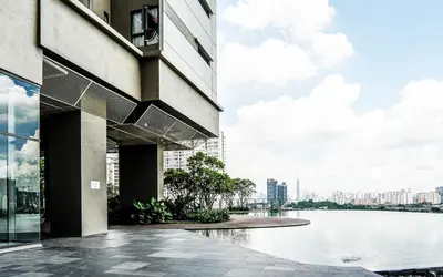 a view of a building with a body of water at Platz @ KL North Setapak by Airhost in Kuala Lumpur