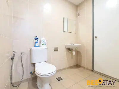 a bathroom with a toilet and a sink at Rafflesia Condominium Sentul by Beestay in Kuala Lumpur