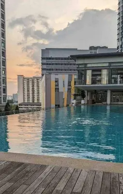 a large swimming pool in front of some buildings at Sunway Velocity link velo mall Muji-2BR \u4e2d\u6587\u623f\u4e1c in Kuala Lumpur