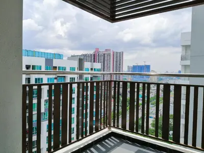 a balcony with a view of the city at Setapak Central Signature Suites by Manhattan Group in Kuala Lumpur