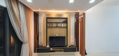 a living room with a tv in a room at The Elements Ampang Infinity Pool in Kuala Lumpur