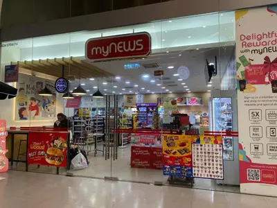 a majus store in a shopping mall with people in it at Summer Suites Apartment 7min walk to KLCC by GRIHOZ in Kuala Lumpur