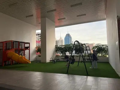 a playground in a building with a view of the city at Chambers Couple studio Klcc in Kuala Lumpur