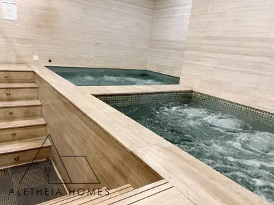 a jacuzzi tub in a bathroom at Aletheia Studio at KLCC in Kuala Lumpur