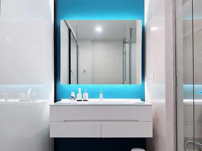 a bathroom with a white sink and a mirror at Tropicana The Residence Hermes Suite with KLCC View in Kuala Lumpur