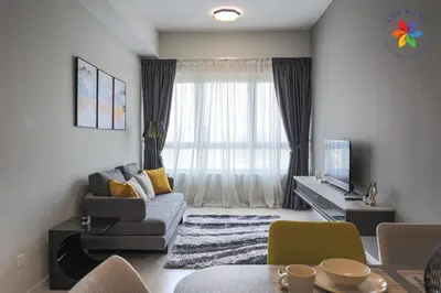 a living room with a couch and a window at The Pano @ Jalan Ipoh by Lily and Loft in Kuala Lumpur
