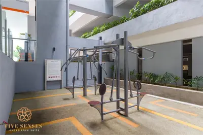 a row of gym equipment in a building at Neu Suites Residence Kuala Lumpur, Roam in Kuala Lumpur