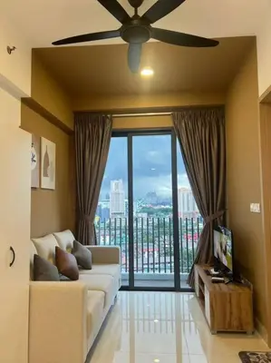 a living room with a couch and a large window at Relax Bedroom Studio, The Luxe in Kuala Lumpur