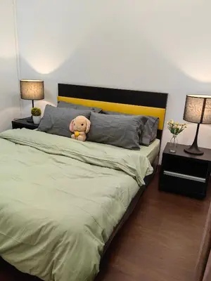 a teddy bear sitting on top of a bed at 5 Bukit Bintang 5 minutes to Alor Street Bukit Ceylon KLCC Pavilion Apt 3R2B 10 pax in Kuala Lumpur