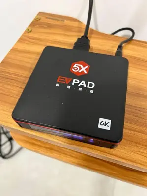 a laptop computer sitting on top of a wooden table at 2R2B Apartment 10 mins to KLCC in Kuala Lumpur