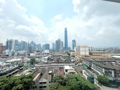a view of a city with tall buildings and buildings at Infini Suites@ D'Majestic Place Kuala Lumpur in Kuala Lumpur