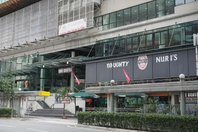 a large building with a nittidis sign on it at Park View KLCC ,by DeLive Home in Kuala Lumpur