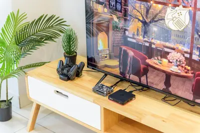 a television on a dresser in a living room at Zen-Inspired Duplex Luxury 6Pax, Arte Mont Kiara by Verano in Kuala Lumpur