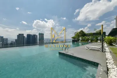 a swimming pool on the roof of a building at Maxhome Cozy at Dorsett Bukit Bintang in Kuala Lumpur
