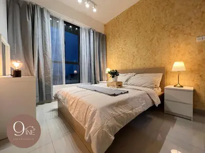 a bedroom with a large bed and a window at TF009 - Lavile Sunway Velocity KL View in Kuala Lumpur