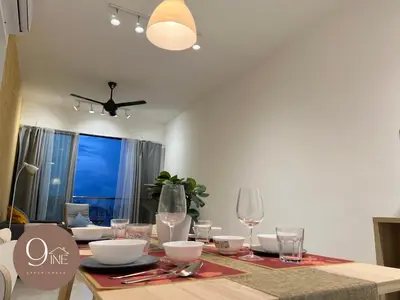 a dining room table with bowls and glasses on it at TF009 - Lavile Sunway Velocity KL View in Kuala Lumpur