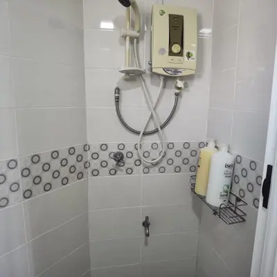 a bathroom with a shower with a soap dispenser at Warisan cityview jalan cheras 56000KL in Kuala Lumpur