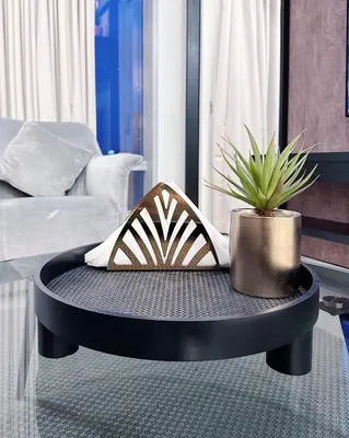 a coffee table with a potted plant on top of it at Luxury Suites at Tropicana Residences KLCC by VV in Kuala Lumpur