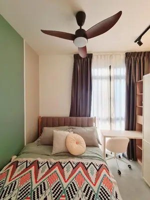 a bedroom with a bed with a ceiling fan at Cozy Modern Tiny Home 2R1B 10 mins to KLCC in Kuala Lumpur