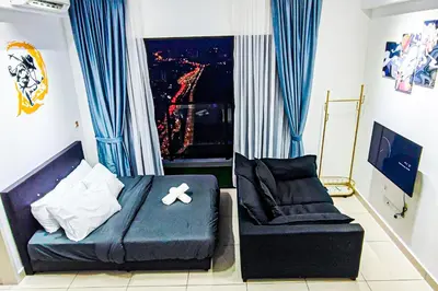 a living room with a couch and a chair at Luxury Balcony at Trion KL by HCK in Kuala Lumpur