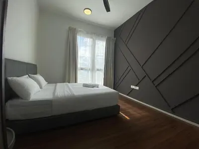 a bedroom with a bed and a large window at Infini Suites@ UNA Residences, Sunway Velocity KL in Kuala Lumpur