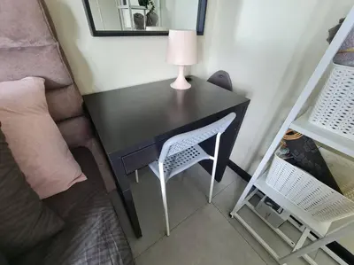 a desk with a lamp and a chair in a room at Homeaway 2R1B 10 mins to KLCC in Kuala Lumpur