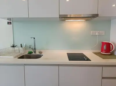 a kitchen with a sink and a counter top at RM203A Bukit Bintang Balcony Studio Infinity Pool in Kuala Lumpur