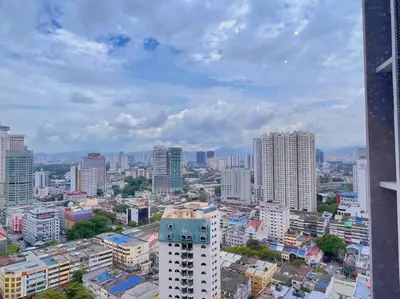 a view of a city with tall buildings at Comfy & Cozy Chambers KL, Near PWTC & Sunway Putra Mall in Kuala Lumpur