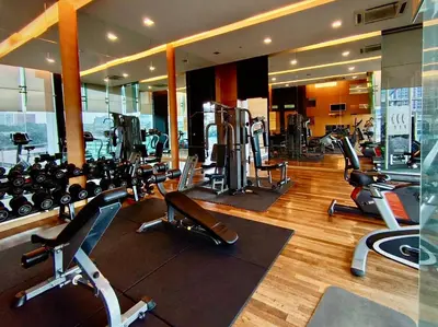a gym with a lot of treadmills and exercise bikes at BBHomes at Bukit Bintang Casa Residency KL in Kuala Lumpur
