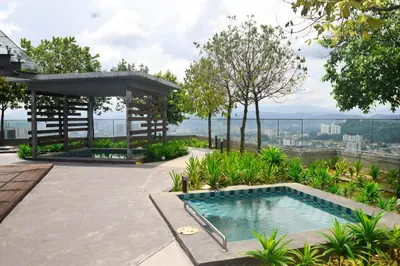 a swimming pool on top of a building at EkoCheras Loft 5 pax, #SoccerTable #AboveMall #Cozy #FreeCarPark in Kuala Lumpur