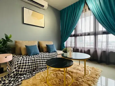 a living room with a bed and a table at MVD15#Family Suite 8pax 3 Rooms Sunway Velocity Mall Cheras IKEA Mytown Short Walk to MRT & LRT Maluri in Kuala Lumpur