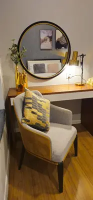 a mirror over a chair in a room with a mirror at Luxurious Ceylonz Suite near Bukit Bintang 4pax in Kuala Lumpur